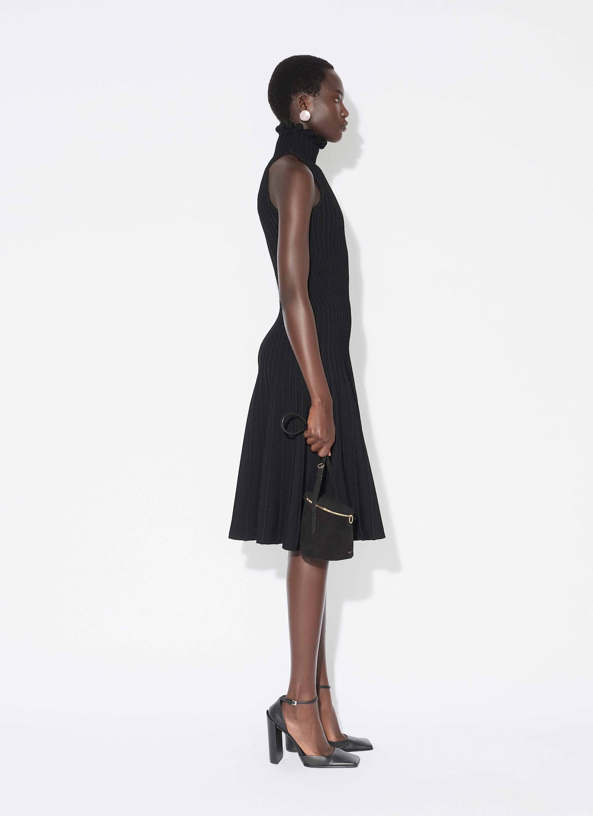 RIBBED KNIT CURLED HIGH NECK DRESS ALAÏA BLACK RIBBED KNIT CURLED HIGH NECK DRESS